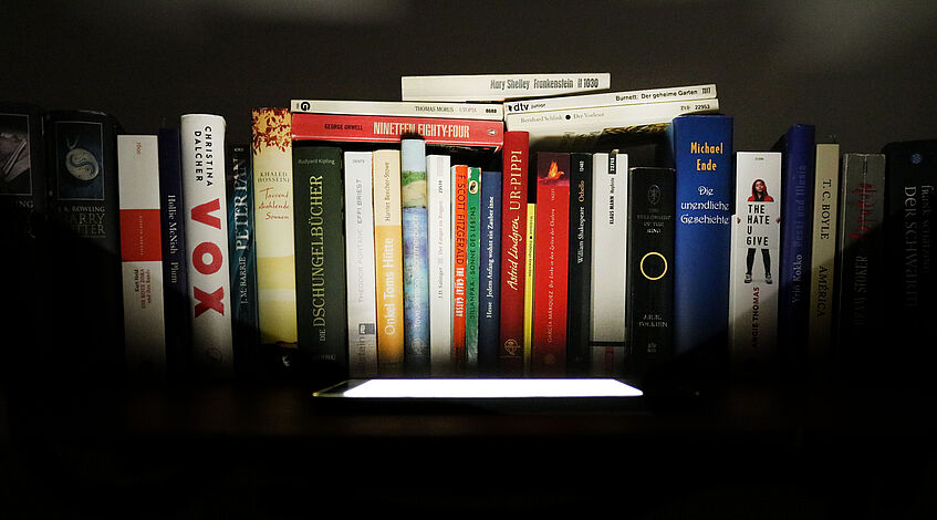 books lightend by an eReader